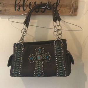 Dark brown Montana west cross purse.